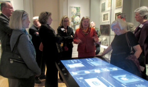 Sarah Coffin introduces one of the museum’s table-top interactives.