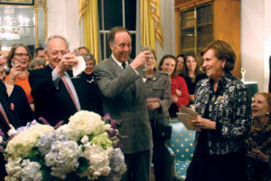 Trust Board Treasurer Chuck Akre and John Hunt, a.k.a. Mr. Penny Hunt, lead a toast to Penny. Photo courtesy Classical American Homes Preservation Trust.