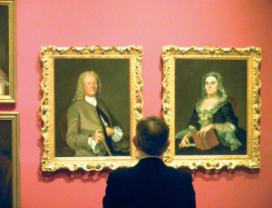 Hornor Davis admires Blackburn’s portraits of Mr. and Mrs. John Harvey at the Bermuda National Gallery.