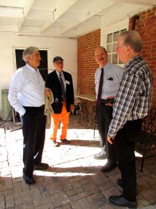 Ron Miller, Ralph Harvard, Bruce Perkins, and Roger Moss discuss brickwork and mortar joints at Richmond.