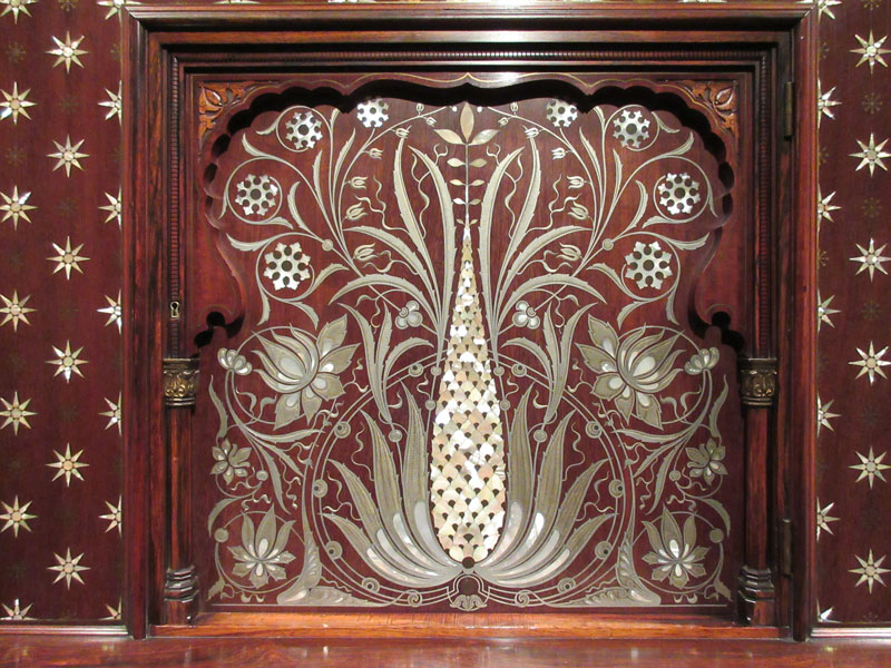 Mother-of-pearl inlay on a c. 1884 Schastey cabinet.
