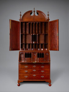 Christopher Townsend, cabinetmaker, and Samuel Casey, silversmith, Desk and Bookcase, Newport, 1745–50. Mahogany (primary); sabicu(?) and mahogany (secondary); silver hardware. Private collection