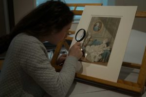 Margot examining an Carmontelle portrait at the Cleveland Museum of Art.