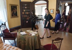 Trust members view the newly remodeled drawing room in the Stowe Center