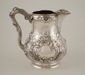 Figure 6. Water pitcher, 1852–1853, coin silver, by Küchler & Himmel for Hyde & Goodrich (New Orleans); The Historic New Orleans Collection, 1978.175.11