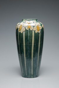 Figure 7. Vase with stylized jonquil design, decorated by Harriet Joor, c. 1903. Earthenware. Courtesy of the Newcomb Art Museum of Tulane University (2012.6.2A).