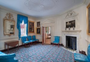 Fig. 1. The reinterpreted front parlor features a newly made suite of backstools and sofa upholstered in Saxon blue damask. Leroy Graves and Harrison Higgins made the seating furniture based on documentary evidence in the Fairfax account book.