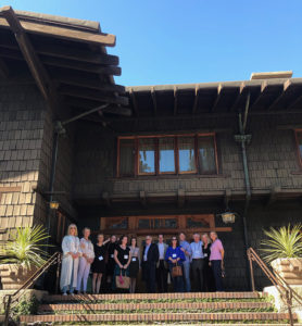 Gamble House exterior with group of program participants