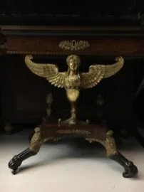 A detail of a Lannuier card table