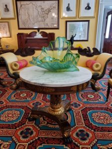 Duncan Phyfe center table with Green Glass Seaform Set by Dale Chihuly