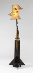 Eileen Gray (1878-1976), “Rocket” floor lamp, 1923. Lacquer, wood, painted parchment shade (modern replacement), electrical parts. 73 x 20 ½ in. (185.4 x 52 cm). Virginia Museum of Fine Arts, Richmond, Gift of Sydney and Frances Lewis, 85.169a-c.