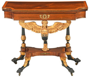 Attributed to Duncan Phyfe. Fine classical gilt, vert antique, and rosewood caryatid table, 1815-1820. 29 ¼ x 35 ¾ x 18 in. The Estate of William N. Banks, Jr., Newnan, Georgia. Estimate: $40,000 - $60,000.