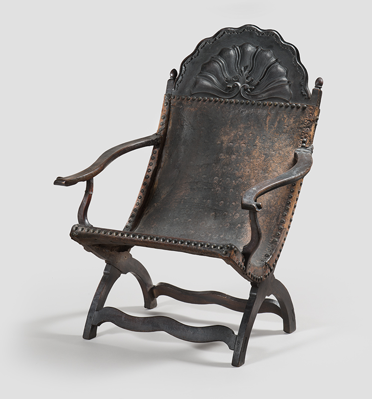Figure 5. Butaca chair, 1730–1770, probably Campeche, Mexico. Mahogany; leather, brass. Partial gift of Bowman Properties and purchased with the Thomas Skelton Harrison Fund, 2012-178-1.