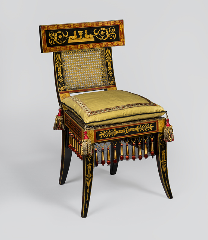 Figure 7. Benjamin Henry Latrobe (designer), John Aitken (cabinetmaker), George Bridport (painter); John Rea (original upholsterer), Chair, 1808, Philadelphia, PA. Tulip poplar, oak; gilded and painted decoration, replacement upholstery. Purchased with the gift (by exchange) of Mrs. Alex Simpson, Jr., and A. Carson Simpson, and with funds contributed by Mr. and Mrs. Robert L. Raley and various donors, 1986-126-4.