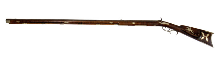 Figure 9. John M. Whiteside, Rifle, 1850-1880, Washington County, VA. Long rifle, full-stock, wood (probably curly maple) with silver inlay decoration. WA-3039-08.