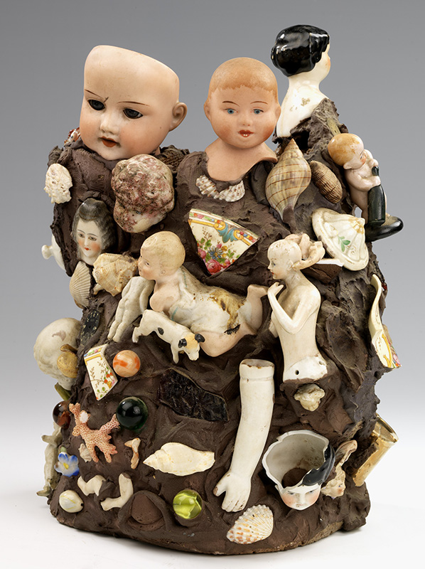 Figure 5. Anonymous, Memory Vessel with Doll Parts, n.d., sewer pipe clay overlaid with applied brown compound, 11 5/8 x 9 1/8 x 8 in. Smithsonian American Art Museum: Luce Center, Gift of Herbert Waide Hemphill, Jr., 1998.84.67.