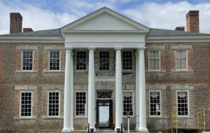 The land front of Sabine Hall, 1738 with Aquia stone lintels, sills, and centerpiece. The roof was lowered and portico added in 1829.