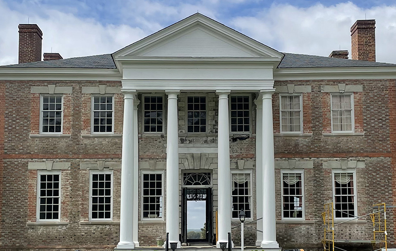 The land front of Sabine Hall, 1738 with Aquia stone lintels, sills, and centerpiece. The roof was lowered and portico added in 1829.