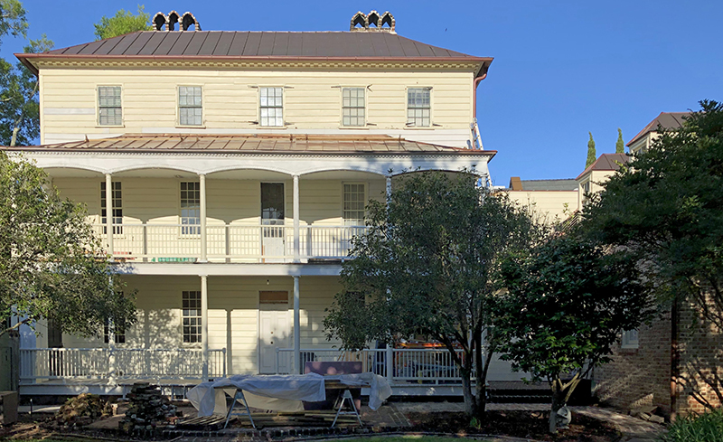 Figure 9. An unsympathetic 1988 addition to the house was torn down in 2019 and replaced with a new addition on the north side (at right), the design and location of which were informed by evidence of the original kitchen house.