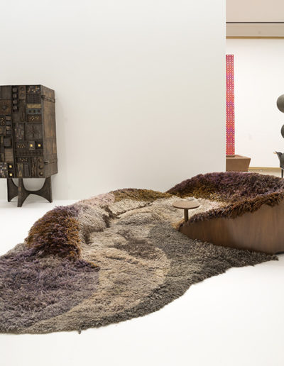 Figure 2. Gallery installation Paul Evans’s Forged Front Cabinet with Base, 1969, and Urban Jupena’s Crevice (Smithsonian Rug),1975, from With Eyes Opened: Cranbrook Academy of Art Since 1932. Courtesy Cranbrook Art Museum. Photo by PD Rearick.
