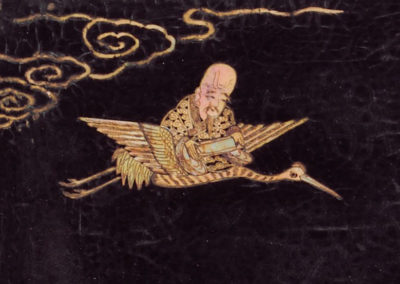 The god of longevity Shoulao, easily recognized by his prominent cranium, is sometimes depicted accompanied by a deer or riding on the back of a crane.