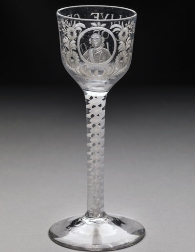 London, England, "Long Live the Prince of Wales" Goblet, c. 1759. Clear and opaque lead glass, engraved bowl. New Orleans Museum of Art, Gift of Melvin P. Billups in memory of his wife, Clarice Marston Billups.
