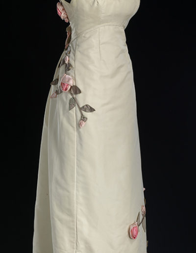 Figure 4. Ivory silk dress decorated with handmade roses. Ann Lowe, 1966–1967. Collection of the Smithsonian National Museum of African American History and Culture. Gift of the Black Fashion Museum founded by Lois K. Alexander-Lane.