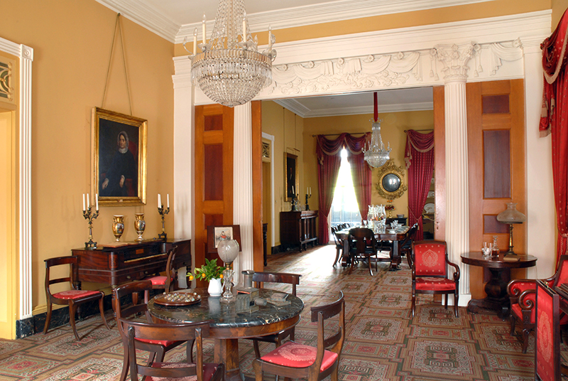 Hermann-Grima House parlor and dining room. Courtesy Hermann-Grima + Gallier Historic Houses.