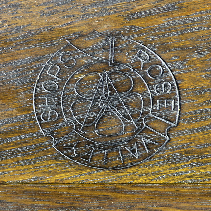 Figure 1. Rose Valley mark, stamped on a trestle bench, c. 1905. Rose Valley Museum. Unless otherwise indicated, all photos by C. Finkbeiner.