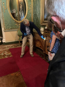Figure 3: Adam Bowett discusses Thomas Chippendale's Diana and Minerva Commode at Harewood House.