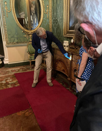 Figure 3: Adam Bowett discusses Thomas Chippendale's Diana and Minerva Commode at Harewood House.