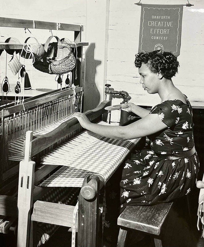 Figure 3. Student weaving in 1955, five years after reintegration. For 45 years prior, weaving was considered exclusive to white Appalachians. Image courtesy of Berea College Special Collections and Archives.