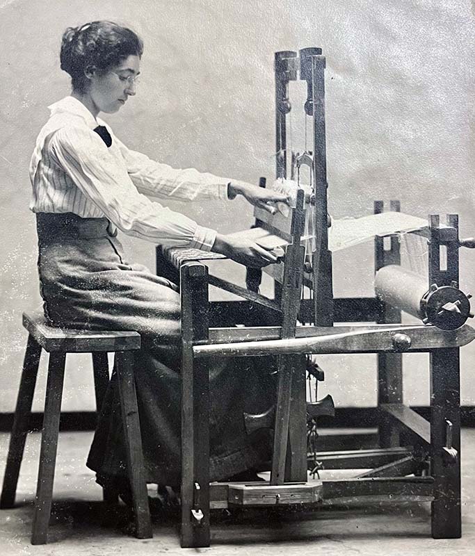 Figure 4. Student weaver at one of the newly designed Ernberg looms, after 1912. Image courtesy of Berea College Special Collections and Archives.