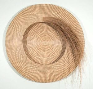 Figure 3. Mary Jackson, 𝘕𝘦𝘷𝘦𝘳 𝘈𝘨𝘢𝘪𝘯, 2007 Charleston, SC. Sweetgrass and Palmetto. Gift of the Braithwaite Family, Gibbes Museum of Art, 2017.005. Photo by Rick Rhodes Photography.