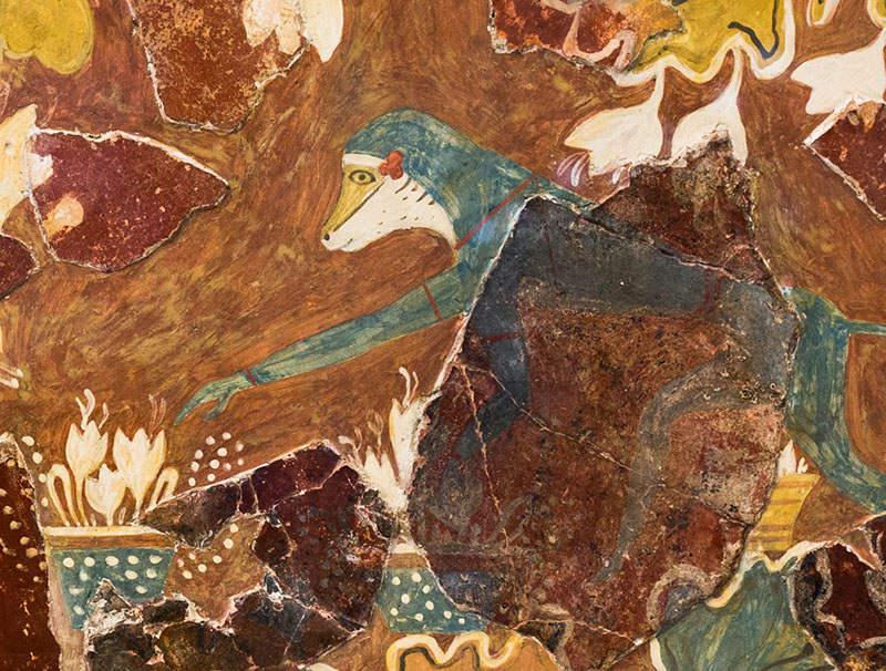 Figure 2. Detail showing the vibrant blue pigment used for the monkey, likely derived from imported lapis lazuli, illustrating the sophisticated trade networks of Bronze Age Crete.