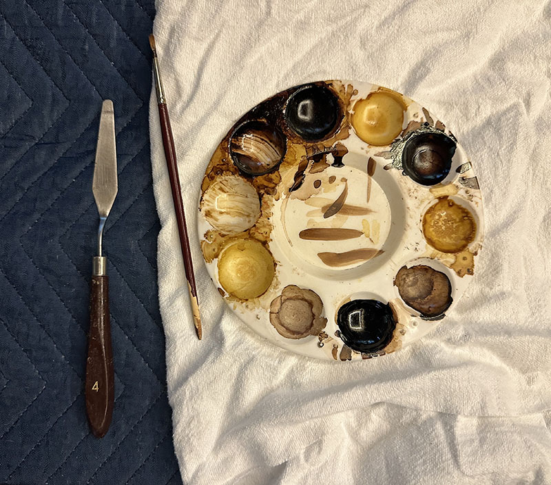 Furniture Conservator Sean Fisher’s shellac palette, which holds a variety of tones to match each custom piece of furniture.