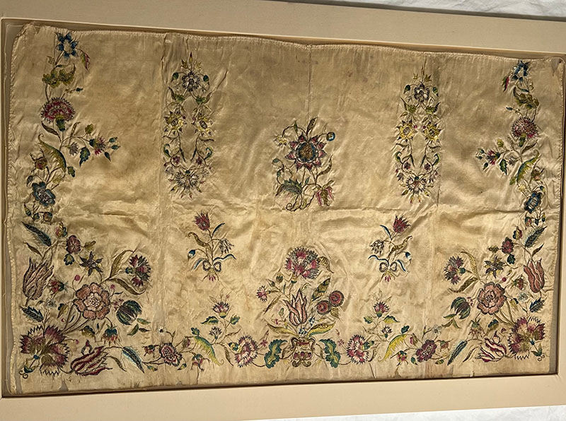 Figure 1. Possibly Mary Hooker Pierpont, Mary Pierpont Russell, or Mary Russell Talcott, Hooker/Pierpont/Russell/Talcott Family Apron, 1730–40, Connecticut. Silk and metallic thread, plain-weave cream silk. Connecticut Historical Society, 1859.9.0.
