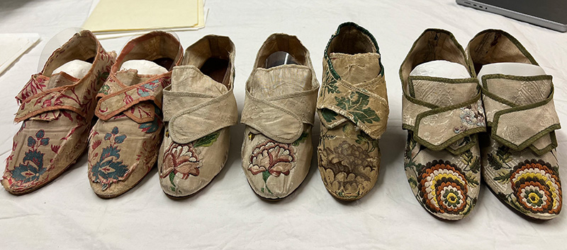 Figure 6. Shoes from Historic New England. Accession numbers from left to right: 1980.105AB (1760-69), 1934.2213AB (1770), 1931.1667 (single shoe, 1740s-60s), and 1919.140AB (1770).