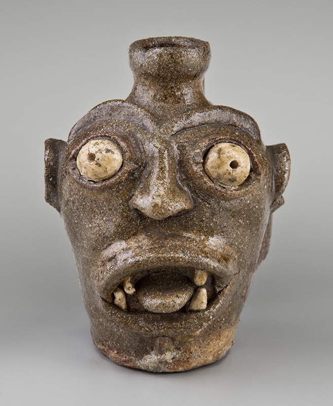 Figure 8. Unrecorded potter, Face jug, 1850–70, Old Edgefield District, SC. Alkaline-glazed stoneware with kaolin. The Chipstone Foundation, 2012.3. Photo by Gavin Ashworth.