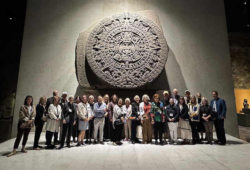 Figure 1. Trust members in front of the Sun Stone (1502–20) at the National Museum of Anthropology, Mexico City, on the November tour led by Jorge F. Rivas Pérez.