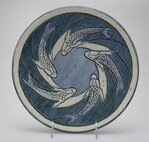 Sabina Elliott Wells, decorator; Joseph Fortune Meyer, potter; Plate with koi fish design, 1904. Newcomb College Pottery, New Orleans, LA. Glazed earthenware. Newcomb Art Museum, 1973.34-C.