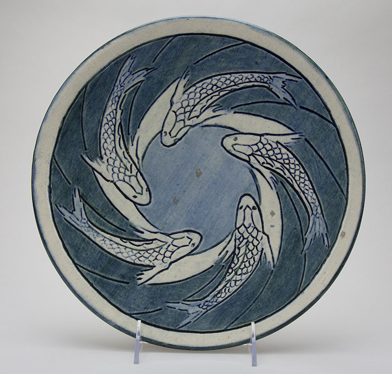 Sabina Elliott Wells, decorator; Joseph Fortune Meyer, potter; Plate with koi fish design, 1904. Newcomb College Pottery, New Orleans, LA. Glazed earthenware. Newcomb Art Museum, 1973.34-C.