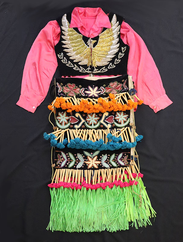 Figure 1. Matachines danza outfit, c. 1950, Saltillo, Mexico. Satin, leather, feathers, embroidery, plastic beads. 2003.07.04. Image courtesy Museo De Las Américas, Denver, CO.