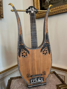 Figure 4. Pierre Charles Mareschal, Lyre Guitar, 1785–1800, France. Spruce, Brazilian rosewood, ormolu, ebony, and mother-of-pearl. Image courtesy of Nemours Estate.