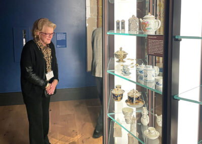 Trust Governor Nancy Mansfield appreciates several among the hundred English teapots displayed in two 12-foot-tall semi-circular cases within The Met’s British Galleries.