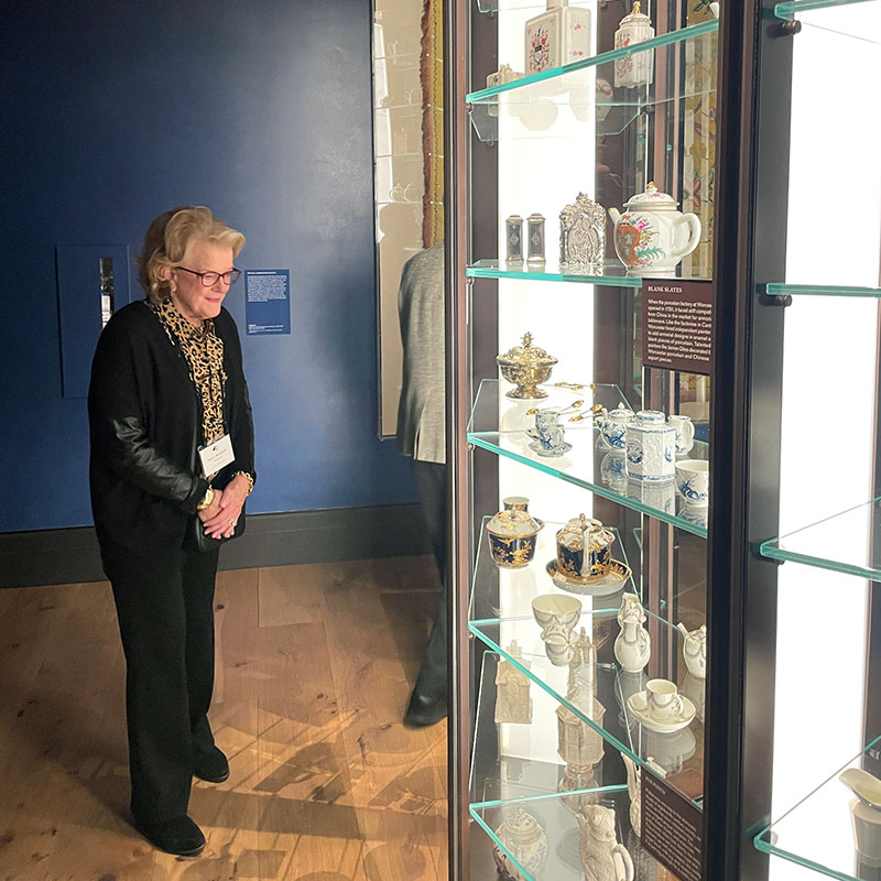 Trust Governor Nancy Mansfield appreciates several among the hundred English teapots displayed in two 12-foot-tall semi-circular cases within The Met’s British Galleries.