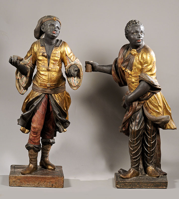 Figure 6. Blackamoors, 18th century, Italy. Painted and gilt wood. Villa La Pietra, Florence.