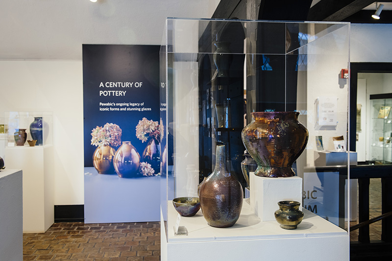 A display in the Pewabic museum, featuring Iridescent Glazed Ceramics. Courtesy of EEBerger.