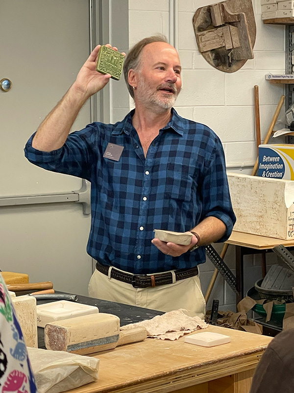 Figure 4. Pewabic Pottery Executive Director Steve McBride demonstrates the tile making process.