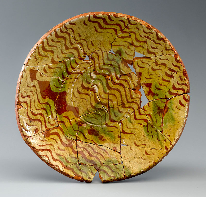 Figure 3. Dish, 1770–90, Philadelphia, PA. Slip decorated earthenware. National Park Service, Independence National Historical Park, INDE 10581.